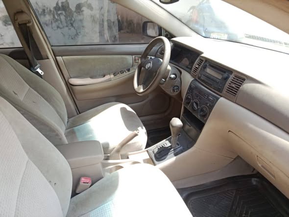A picture of toyota corolla all is untampered engine gear ac money need