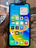 A picture of iPhone X 64gb faceid working 690k only 0759979422 0773648989