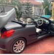 A picture of Peugeot 207 Open Car Year 2009 Engine 1590Cc Dark blue
