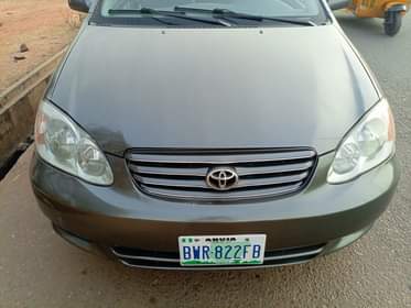A picture of Distress two beautiful Corolla 03 04 model the two is