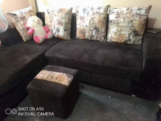 A picture of Mini L shape sofa with puff