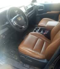 A picture of Honda Ridgeline 2011 Model Colour Black Condition No pin missing
