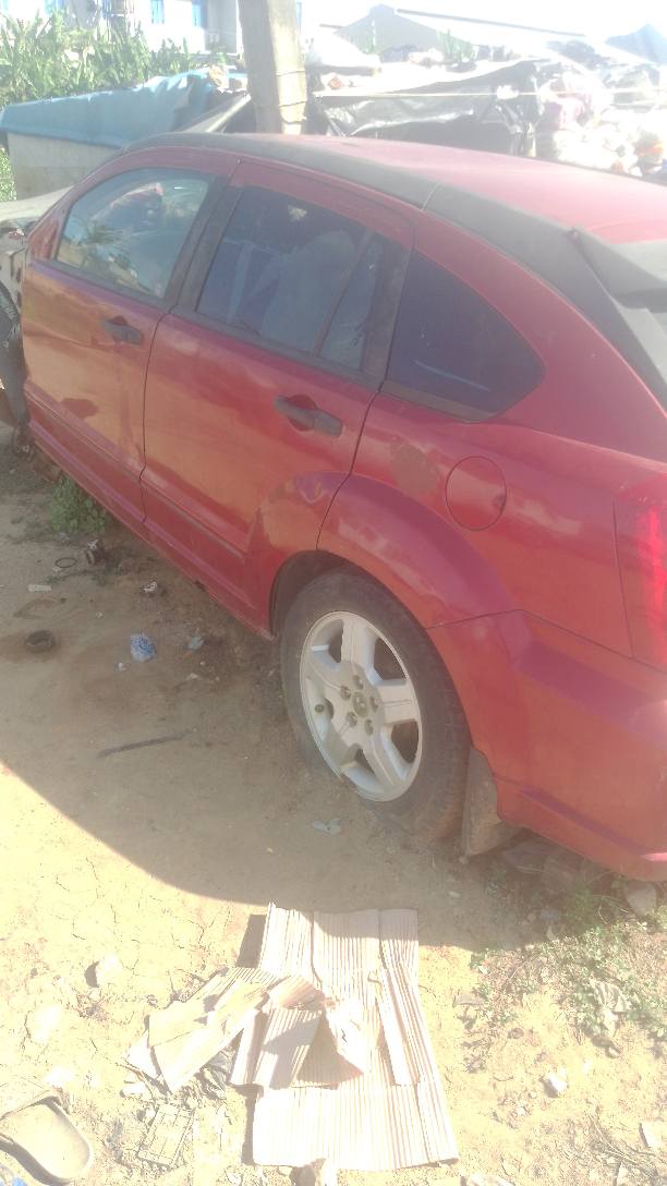 A picture of Abandon tokunbo dodge caliber never been drive in Nigeria 08089782403