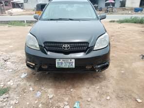 A picture of Dealers market 2004 Toyota matrix Engine gear AC needs attention