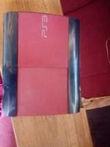 A picture of PS3 super slim with one controller 6games installed