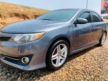 A picture of sharp Camry 2013 barely use 5 7m