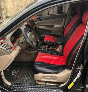 A picture of Clean Nigerian Used Black Toyota Camry 2004.