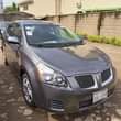 A picture of 2009 Pontiac Vibe and Toyota Corolla