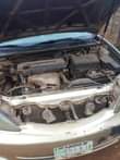 A picture of TOYOTA Camry 4 plugs Good engine and gear Ac needs