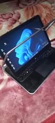 A picture of Dell XPS i7 touchscreen portable and convertible at only 680
