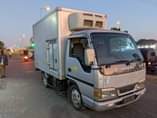 A picture of ISUZU with fridge freezer