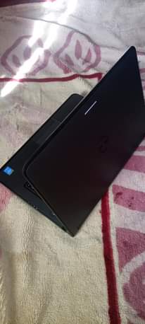 A picture of DELL latitude i5 and 5th generation at 650 000