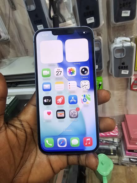 A picture of IPhone13 128gb no change part 390k Abuja deal