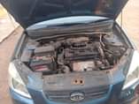 A picture of Kia Rio 1 4 2007 blue
