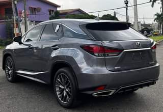 A picture of Accident free lexus rx350 Fsport 2022 model with red interior