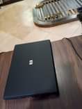 A picture of Hp Compaq Dell Laptops on quick sale at 210k WhatsApp