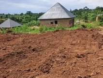 A picture of HALF LONDON WAKISO ESTATE 50BY100 WITH READY LAND TITLE AT
