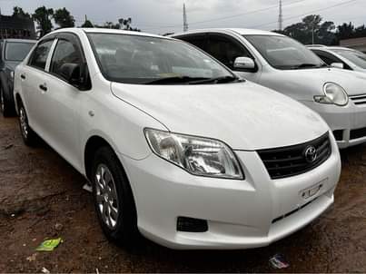 A picture of Toyota Axio Pearl white 30M