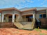 A picture of Wakiso Banda house with four boysquarters Having 5 beedrooms sitting