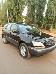 A picture of Lexus RX300 for sale everything working perfectly fine at an