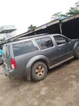 A picture of 2 years used 2006 Nissan Pathfinder first body engine and