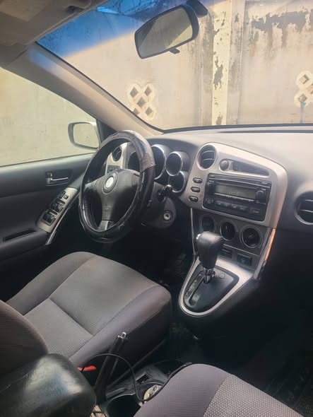 A picture of Toyota matrix 2005 model Owner compound Engine Gear Air Condition