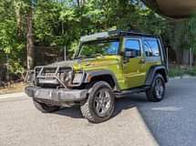 A picture of 2010 Jeep Wrangler Sport SUV 2D Mountain PKG.