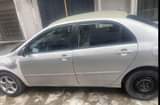 A picture of Toyota Corolla 04 Price 900k from owner not negotiable settlement