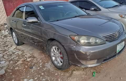 A picture of Toyota Camry 04 driving smooth Buy and paint bumper only