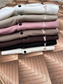 A picture of T shirt material mazuri kwa bei ya jumla0656329552