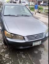 A picture of Toyota Camry pencil light Engine and Gear ok Ac needs
