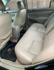 A picture of Toyota camry black ibadan 4plug