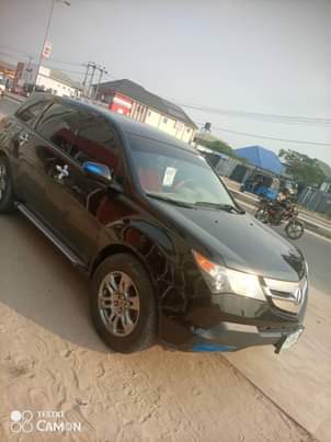 A picture of Belgium grade first flash 2008 model MDX Acura with Engine