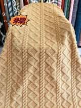 A picture of Woolen blankets available in stock