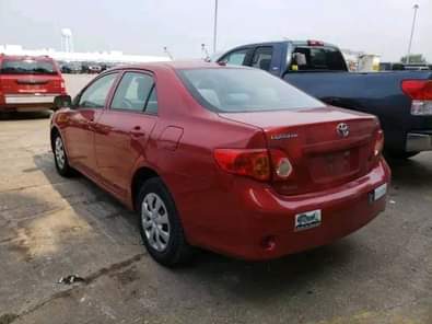 A picture of Nigeria custom services auctioning Cars bags of rice and vegetable