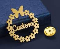 A picture of ustomized name brooches