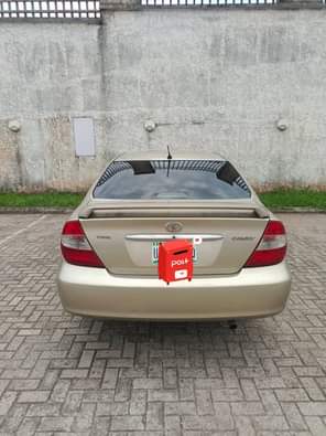 A picture of Clean 05 Toyota Camry Tinted Glass Untampered engine and gear