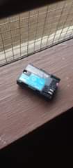 A picture of Radio ya GARI sony Battery ya Canon OG
