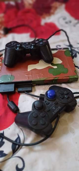 A picture of Nauza PS2 slim iko full waya zake pad 2 na