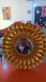 A picture of wall mirror decor lampshades and bottles decor