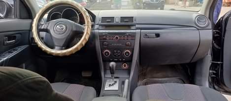 A picture of Mazda 3 salon 2003 model AC engine and gear box