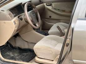 A picture of Distress Sale Toyota Corolla 2003 model buy and fixed Legs