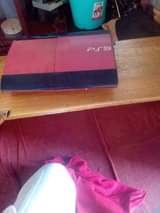 A picture of PS3 super slim with one controller 6games installed