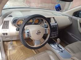 A picture of Nissan Murano 05 model Gear is selecting perfectly AC is