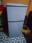 A picture of Nauza fridge la sharp offer lak 250k