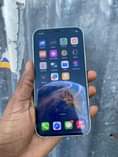 A picture of I phone 12 plain 64gb Face id ok True tone