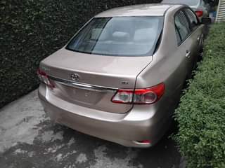 A picture of Toyota corolla 2012 model very clean in and out nothing