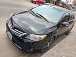 A picture of Super clean 2010 Toyota corolla with metal sound first flash