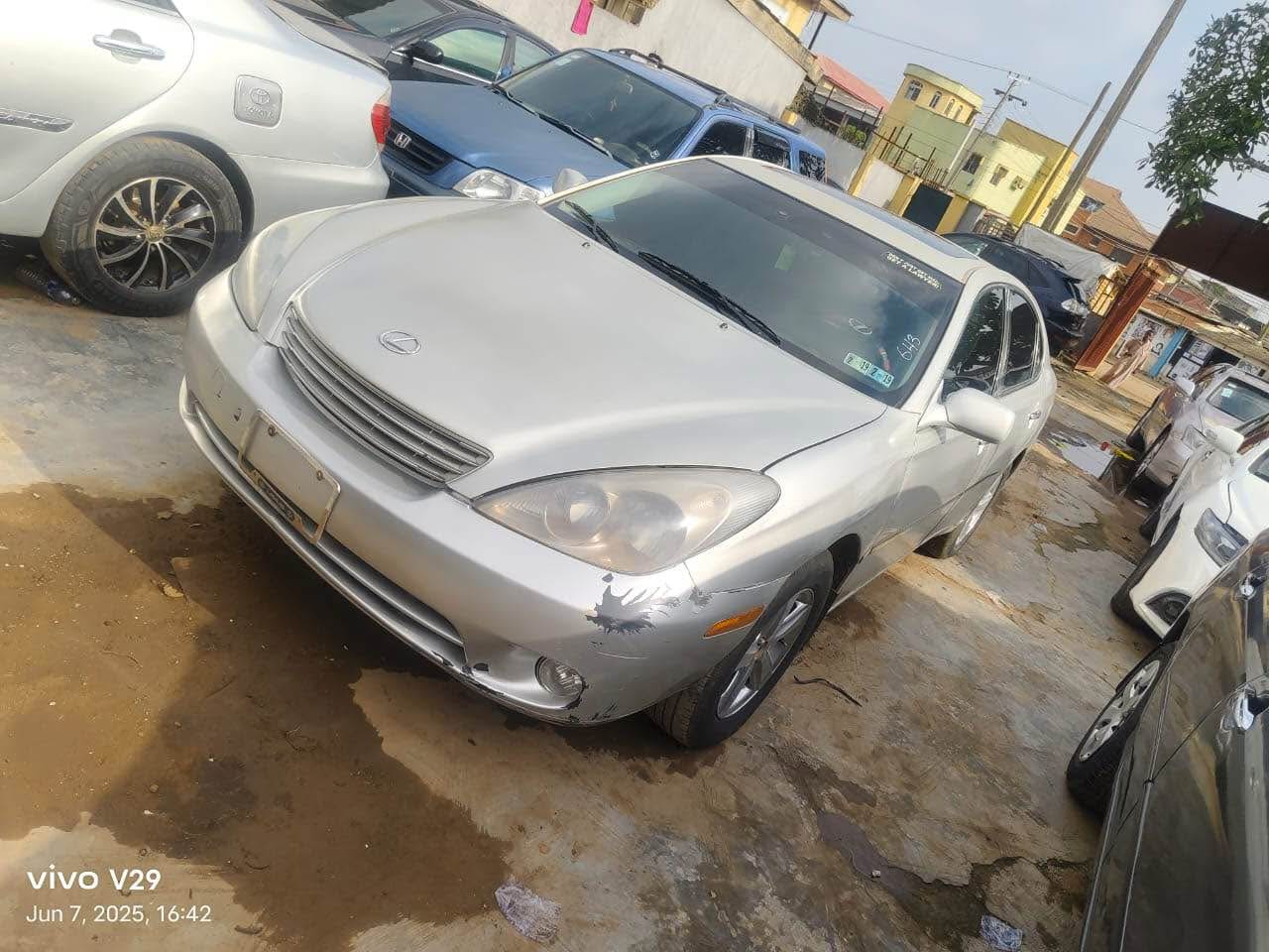 A picture of Lexus ES 300 2004 model engine gear ac android screen