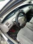 A picture of 2003 Toyota Avalon dashboard first body 1 year old the